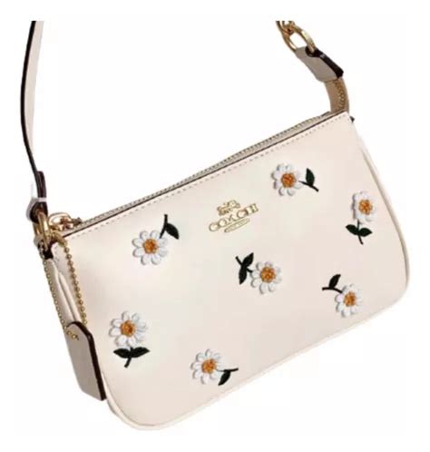 bolsa de flores coach